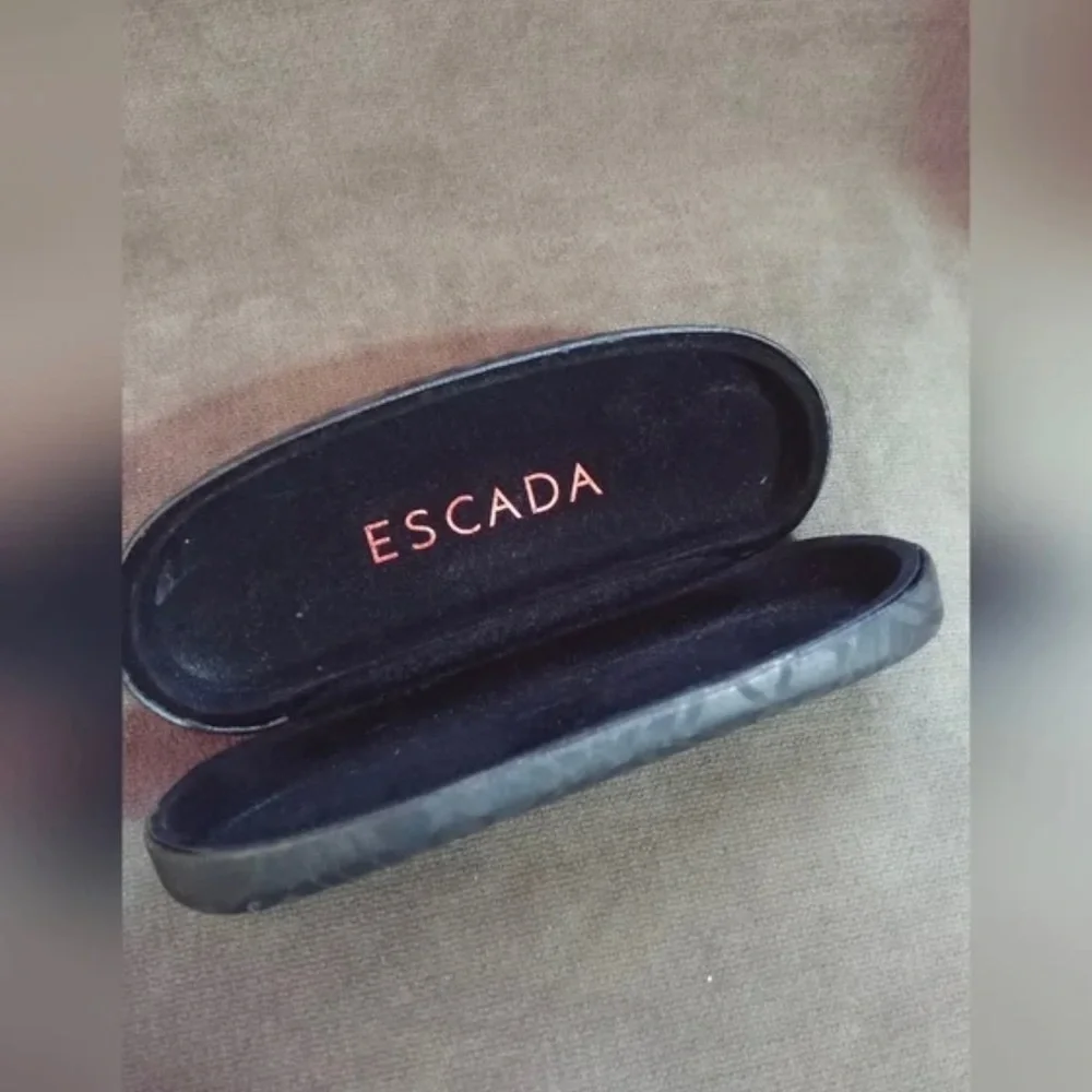Escada glass case